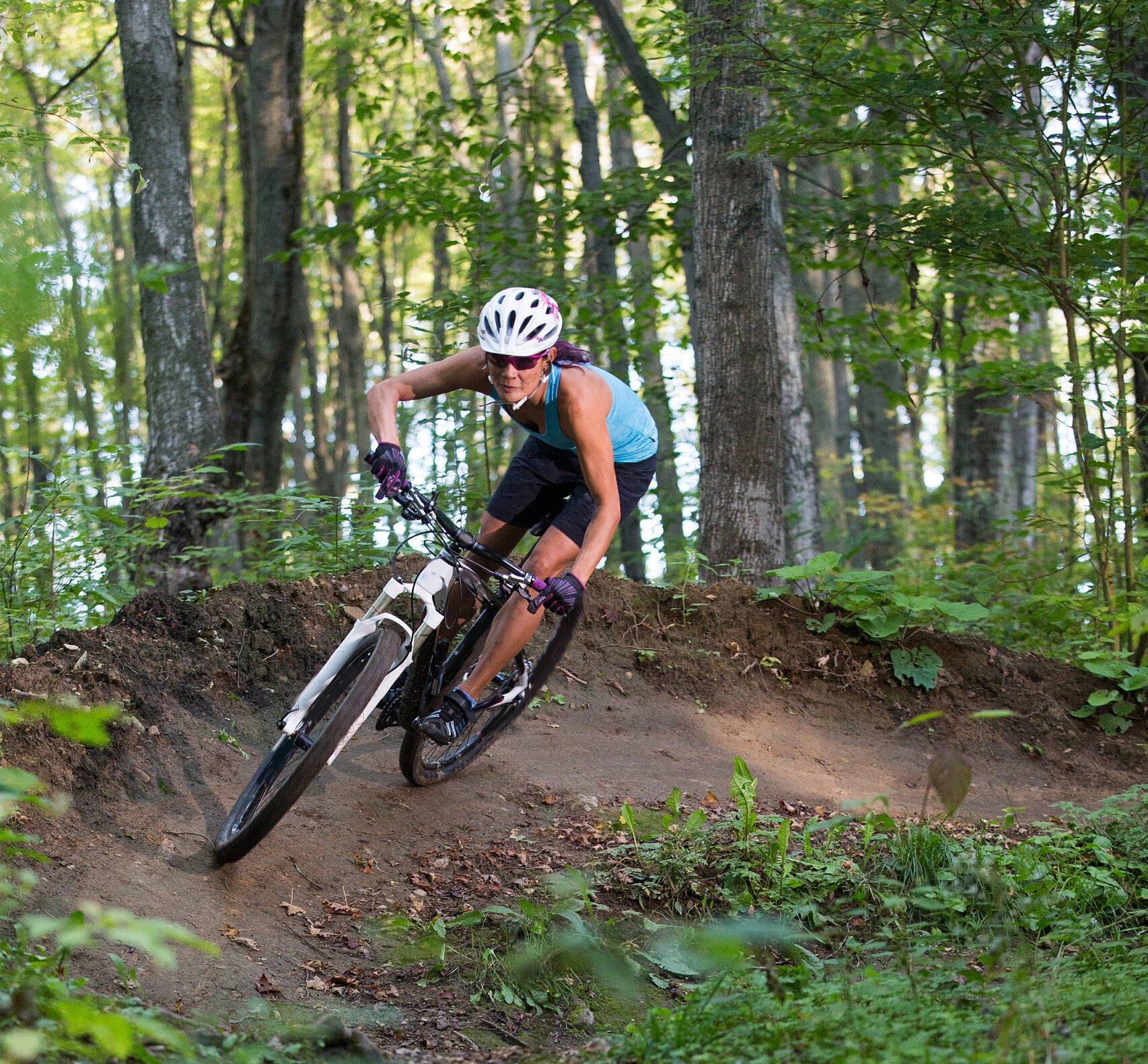 A,Woman,Rides,Her,Mountain,Bike,On,Single,Track,Trail